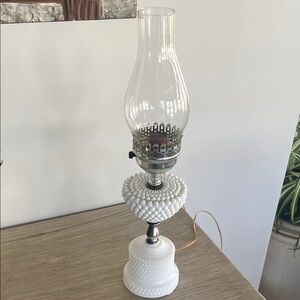 White MILK GLASS hobnail with a hurricane chimney. Tested and works.
